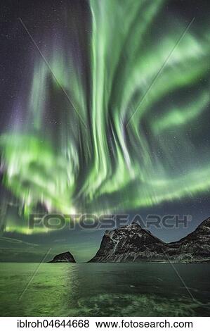 Northern Lights, Aurora Borealis, over frozen lake, Haukland, Lofoten, Norway, Europe View Large Photo Image Stock Photo - Northern Lights, Aurora Borealis, over frozen lake, Haukland, Lofoten, Norway, Europe. Fotosearch