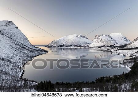 Stock Photo - Norwegian fjord at dusk, Bergspoten, Senja, Norway, Europe. Fotosearch