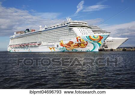 Stock Image - Norwegian Getaway and MSC Fantasia cruise ships moored in the port of Tallinn, Estonia, Europe. Fotosearch
