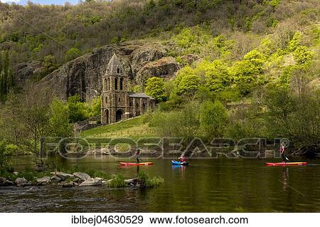 Stock Photo - Notre Dame des Chazes church on the River Allier with canoeists, Haute Loire departement, Auvergne, France, Europe. Fotosearch
