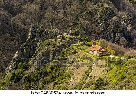Picture - Notre-Dame-D'Estours chapel in the Gorges of Seuges river, Haute Loire departement, Auvergne, France, Europe. Fotosearch
