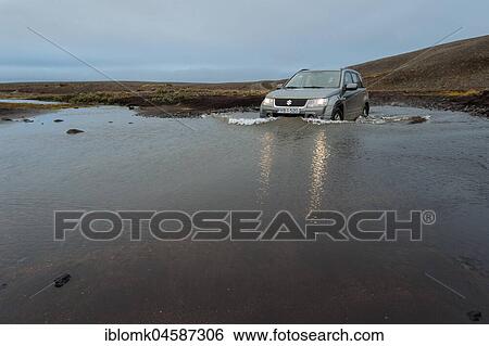 Off road vehicle drives through waterfurt, Sprengisandur highland road, Iceland, Europe View Large Photo Image Stock Photograph - Off road vehicle drives through waterfurt, Sprengisandur highland road, Iceland, Europe. Fotosearch