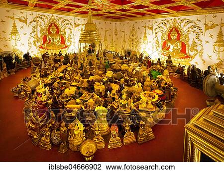 Stock Image - Offerings at the Chedi Wat Phra That Phanom, interior, temple complex in Amphoe That Phanom, Nakhon Phanom Province, Isan, Thailand, Asia. Fotosearch