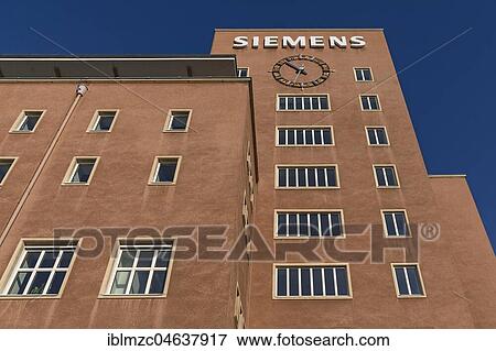 Stock Photo - Office building of the Siemens company, also called Himbeerpalast, Berlin style, built 1948-1953, Erlangen, Middle Franconia, Bavaria, Germany, Europe. Fotosearch