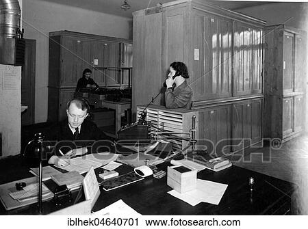 Office, man at the desk, secretary on the phone, 1940s, exact location unknown, Germany, Europe View Large Photo Image Stock Image - Office, man at the desk, secretary on the phone, 1940s, exact location unknown, Germany, Europe. Fotosearch