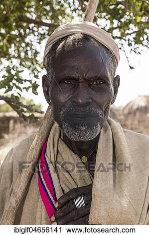 Stock Image - Old man of Arbore tribe, portrait, Turmi, Southern Nations Nationalities and Peoples' Region, Ethiopia, Africa. Fotosearch