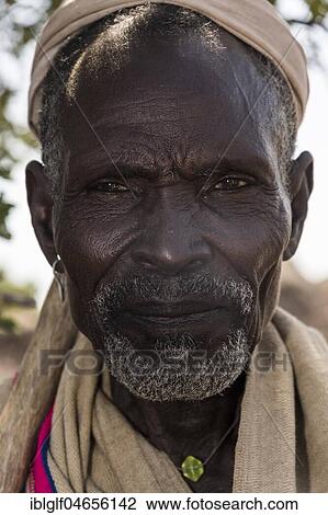 Old man of Arbore tribe, portrait, Turmi, Southern Nations Nationalities and Peoples' Region, Ethiopia, Africa View Large Photo Image Stock Image - Old man of Arbore tribe, portrait, Turmi, Southern Nations Nationalities and Peoples' Region, Ethiopia, Africa. Fotosearch
