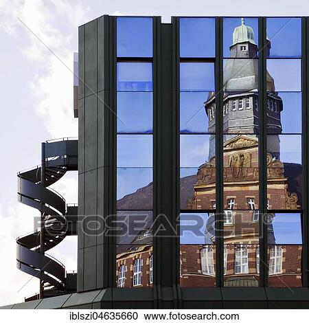 Old post office is reflected in the glass façade of the Citycenter, Gelsenkirchen, Ruhr Area, North Rhine-Westphalia, Germany, Europe View Large Photo Image Stock Image - Old post office is reflected in the glass façade of the Citycenter, Gelsenkirchen, Ruhr Area, North Rhine-Westphalia, Germany, Europe. Fotosearch