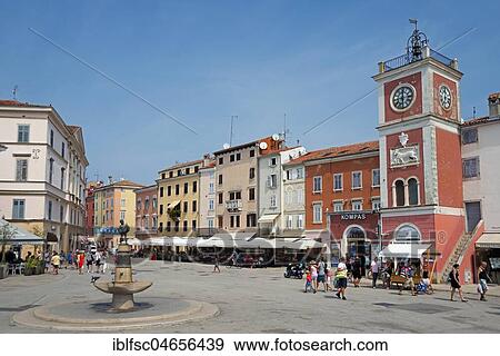 Old town with Venetian clock tower and fountain, Marsala Tita Square, Rovinj, Istria, Croatia, Europe View Large Photo Image Stock Photo - Old town with Venetian clock tower and fountain, Marsala Tita Square, Rovinj, Istria, Croatia, Europe. Fotosearch