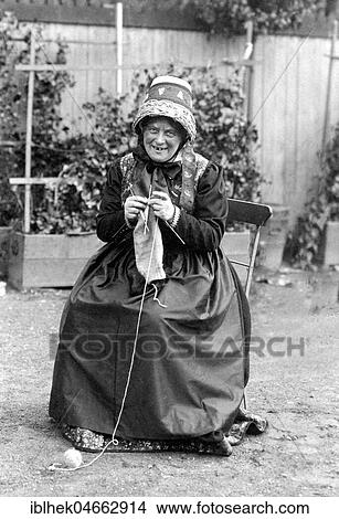 Picture - Old Woman knitting in Traditional Costume, 1930s, Germany, Europe. Fotosearch