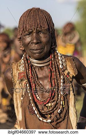 Stock Photo - Old woman with traditional jewellery, portrait, Hamer tribe, Turmi market, Southern Nations Nationalities and Peoples' Region, Ethiopia, Africa. Fotosearch