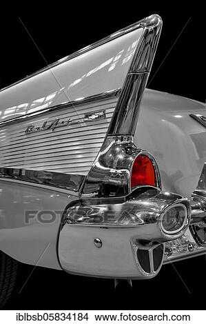 Oldtimer detail, Chevrolet Bel Air 1957, in black and white, with red brake light View Large Photo Image Picture - Oldtimer detail, Chevrolet Bel Air 1957, in black and white, with red brake light. Fotosearch