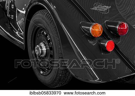 Oldtimer Detail, Morgan +8, in black and white, with red brake light View Large Photo Image Stock Image - Oldtimer Detail, Morgan +8, in black and white, with red brake light. Fotosearch