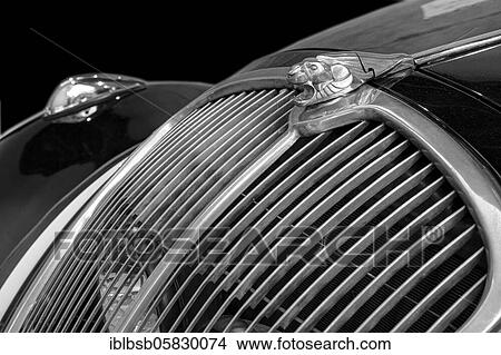Picture - Oldtimer detail, Peugeot 402, in black and white. Fotosearch