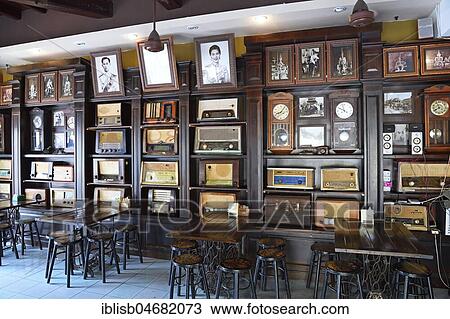 Stock Image - Original restaurant with old radios, Phuket Town, Phuket, Thailand, Asia. Fotosearch