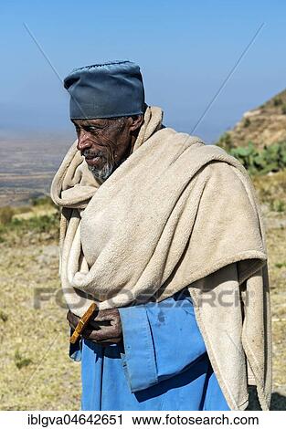 Orthodox priest of the monolithic church Daniel Korkor, Gheralta Mountains, Tigray, Ethiopia, Africa View Large Photo Image Stock Image - Orthodox priest of the monolithic church Daniel Korkor, Gheralta Mountains, Tigray, Ethiopia, Africa. Fotosearch