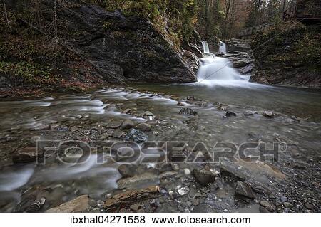 Ostertalbach im Ostertaltobel mit kleinem Wasserfall, Herbststimmung, Gunzesried-Sage, Allgau, Bayern, Deutschland, Europa View Large Photo Image Stock Photo - Ostertalbach im Ostertaltobel mit kleinem Wasserfall, Herbststimmung, Gunzesried-Sage, Allgau, Bayern, Deutschland, Europa. Fotosearch