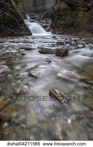 Ostertalbach im Ostertaltobel mit kleinem Wasserfall, Herbststimmung, Gunzesried-Sage, Allgau, Bayern, Deutschland, Europa View Large Photo Image Stock Photograph - Ostertalbach im Ostertaltobel mit kleinem Wasserfall, Herbststimmung, Gunzesried-Sage, Allgau, Bayern, Deutschland, Europa. Fotosearch
