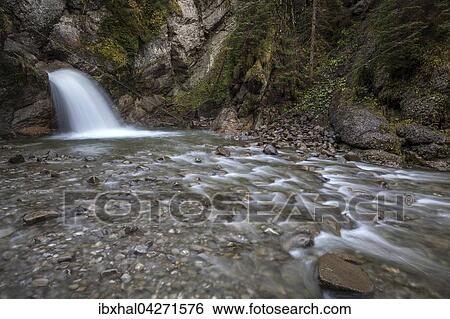 Ostertalbach im Ostertaltobel mit kleinem Wasserfall, Herbststimmung, Gunzesried-Sage, Allgau, Bayern, Deutschland, Europa View Large Photo Image Stock Photograph - Ostertalbach im Ostertaltobel mit kleinem Wasserfall, Herbststimmung, Gunzesried-Sage, Allgau, Bayern, Deutschland, Europa. Fotosearch