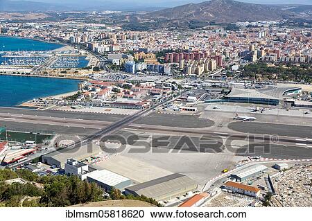 Stock Image - Overview Gibraltar Airport (GIB) with runway and terminal, Gibraltar, Europe. Fotosearch