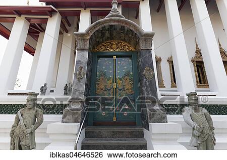 Painted door and stone figures in front of the Ubosot, Wat Suthat, Royal Temple, Phra Nakhon, Bangkok, Thailand, Asia View Large Photo Image Stock Photograph - Painted door and stone figures in front of the Ubosot, Wat Suthat, Royal Temple, Phra Nakhon, Bangkok, Thailand, Asia. Fotosearch