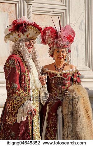 Stock Image - Pair in historical costumes, Baroque costume, Carnival in Venice, Italy, Europe. Fotosearch