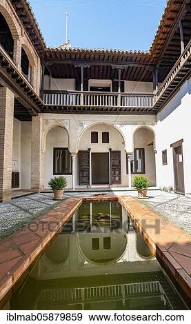 Stock Photo - Patio, Casa Morisca de la calle Horno de Oro, old Moorish house with inner courtyard and well, Granada, Andalusia, Spain, Europe. Fotosearch