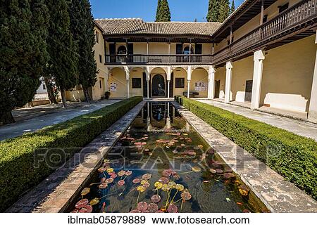 Stock Photo - Patio with fountain, Casa del Chapiz, Escuela de Estudios Árabes, old Moorish house, Granada, Andalusia, Spain, Europe. Fotosearch