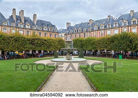 Stock Image - Pavillon de la Reine, Fountain, Place des Vosges, Paris, France, Europe. Fotosearch