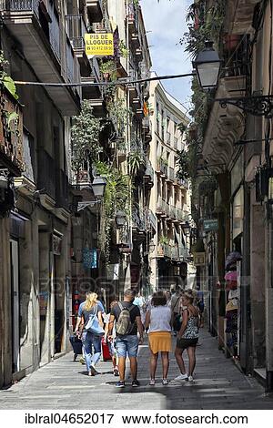 People in narrow street between houses, Jewish quarter, Barcelona, Catalonia, Spain, Europe View Large Photo Image Stock Photo - People in narrow street between houses, Jewish quarter, Barcelona, Catalonia, Spain, Europe. Fotosearch