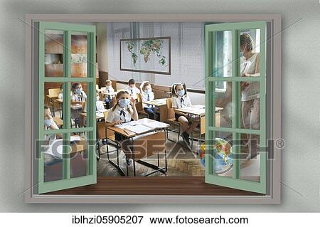 Stock Photo - Photomontage, primary school children having classes during the Corona pandemic. Fotosearch