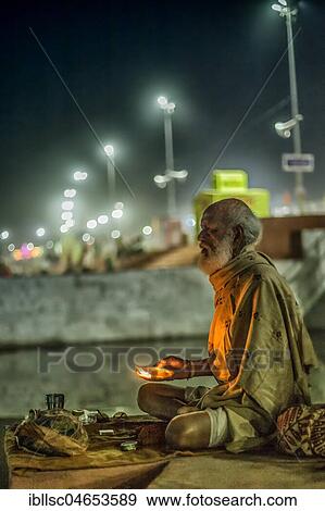 Pilgrim with oil lamp during Hindu festival Kumbh Mela, Ujjain, India, Asia View Large Photo Image Stock Photo - Pilgrim with oil lamp during Hindu festival Kumbh Mela, Ujjain, India, Asia. Fotosearch