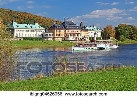 Stock Photograph - Pillnitz Castle on the banks of the Elbe River with historical paddle steamer, Pillnitz, Dresden, Elbe, Saxony, Germany, Europe. Fotosearch