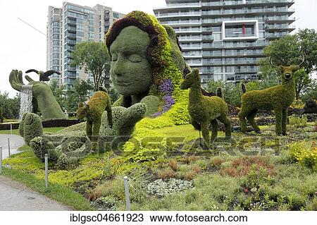 Plant sculpture Mother Earth with modern buildings behind, Mosaicanada Exhibition, Gatineau, Quebec Province, Canada, North America View Large Photo Image Stock Image - Plant sculpture Mother Earth with modern buildings behind, Mosaicanada Exhibition, Gatineau, Quebec Province, Canada, North America. Fotosearch