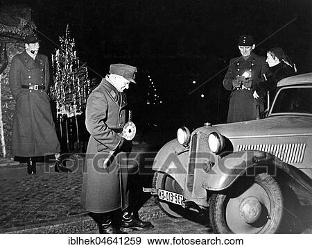 Stock Photo - Police officers during a traffic check, 1960s, Berlin, Germany, Europe. Fotosearch