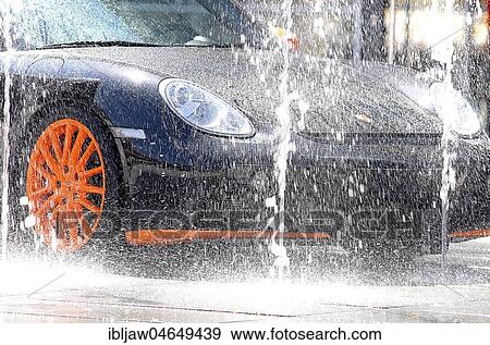 Stock Photo - Porsche in a rain simulator, test track, Germany, Europe. Fotosearch