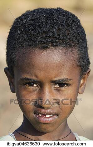 Stock Image - Portrait of a Tigray girl, Hawzen, Province of Tigray, Ethiopia, Africa. Fotosearch