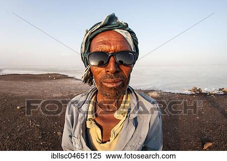 Portrait of a worker in the Dallol Salt Desert, Ethiopia, Africa View Large Photo Image Stock Photography - Portrait of a worker in the Dallol Salt Desert, Ethiopia, Africa. Fotosearch