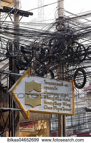 Stock Photo - Post with cable tangle, chaotic cables, cable tangle, at the Thanon Charoen Krung, Bang Rak, Bangkok, Thailand, Asia. Fotosearch