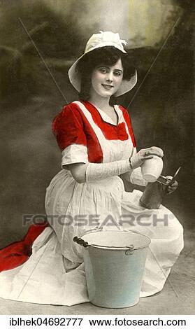 Stock Photo - Profession, maid, young cleaning woman, 1900s, Germany, Europe. Fotosearch