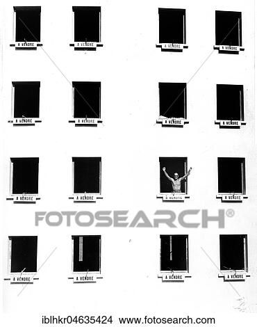 Picture - Proud buyer of an apartment, between 50s and 60s, exact location unknown, France, Europe. Fotosearch