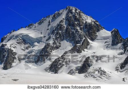 Stock Image - Pyramidenartiger, vergletscherter Gipfel Aiguille du Chardonnet, 3824 m, Mont-Blanc-Massiv, Departement Haute-Savoie, Frankreich, Europa. Fotosearch