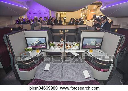 Qatar Airways introduces its new business-class seat, ITB, International Tourism Fair Berlin, Germany, Europe View Large Photo Image Stock Image - Qatar Airways introduces its new business-class seat, ITB, International Tourism Fair Berlin, Germany, Europe. Fotosearch