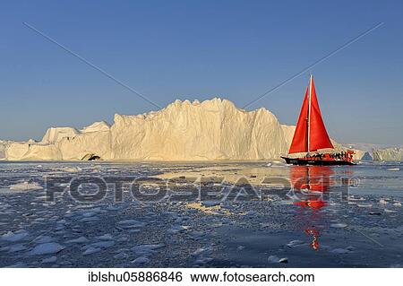 Red sailing boat in front of icebergs, Icefjord, UNESCO World Heritage, Disko Bay, Ilulissat, West Greenland, Greenland, North America View Large Photo Image Stock Photograph - Red sailing boat in front of icebergs, Icefjord, UNESCO World Heritage, Disko Bay, Ilulissat, West Greenland, Greenland, North America. Fotosearch