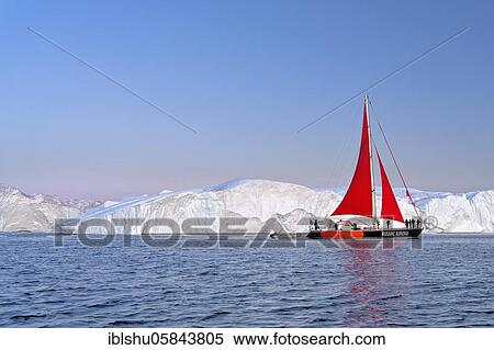 Red sailing boat in front of icebergs at the blue hour, Icefjord, UNESCO World Heritage Site, Disko Bay, Ilulissat, West Greenland, Greenland, North America View Large Photo Image Stock Photography - Red sailing boat in front of icebergs at the blue hour, Icefjord, UNESCO World Heritage Site, Disko Bay, Ilulissat, West Greenland, Greenland, North America. Fotosearch