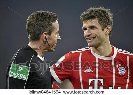 Referee Tobias Stieler in friendly dialogue with Thomas Müller of FC Bayern Munich, Allianz Arena, Munich, Bavaria, Germany, Europe View Large Photo Image Picture - Referee Tobias Stieler in friendly dialogue with Thomas Müller of FC Bayern Munich, Allianz Arena, Munich, Bavaria, Germany, Europe. Fotosearch