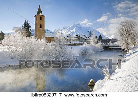 Stock Photo - River Inn, St. Lawrence Church, Sils, Graubuenden, Switzerland, Europe. Fotosearch