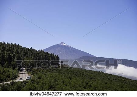 Road with volcano Pico del Teide, Teide National Park, Parque Nacional del Teide, Tenerife, Canary Islands, Spain, Europe View Large Photo Image Stock Photo - Road with volcano Pico del Teide, Teide National Park, Parque Nacional del Teide, Tenerife, Canary Islands, Spain, Europe. Fotosearch