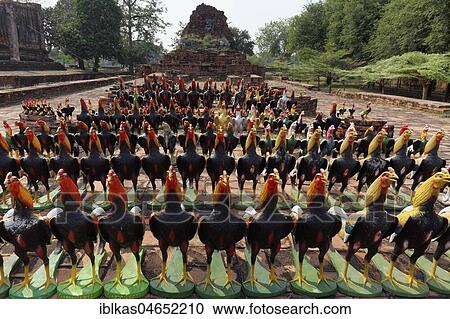 Rooster figures lined up in front of a Buddhist temple, souvenirs, Wat Thammikarat, Ayutthaya History Park, Ayutthaya, Thailand, Asia View Large Photo Image Stock Image - Rooster figures lined up in front of a Buddhist temple, souvenirs, Wat Thammikarat, Ayutthaya History Park, Ayutthaya, Thailand, Asia. Fotosearch