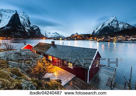 Rotes Haus im Winter mit Blick auf Fjord, Fischerdorf Reine, Rorbuer oder Rorbu, Reinefjord, Moskenesoya, Lofoten, Norwegen, Europa View Large Photo Image Stock Photo - Rotes Haus im Winter mit Blick auf Fjord, Fischerdorf Reine, Rorbuer oder Rorbu, Reinefjord, Moskenesoya, Lofoten, Norwegen, Europa. Fotosearch